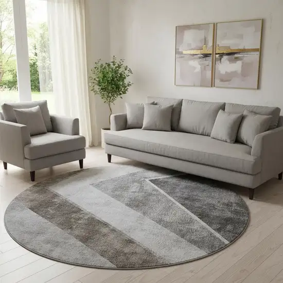 8' Gray Brown And Silver Geometric Washable Round Rug With UV Protection Photo 1
