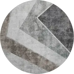 Photo of 8' Gray Brown And Silver Geometric Washable Round Rug With UV Protection