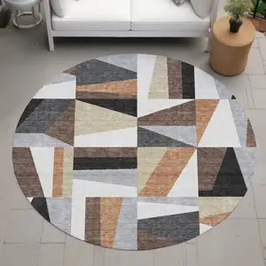 Photo of 8' Gray Brown And White Round Geometric Washable Indoor Outdoor Area Rug