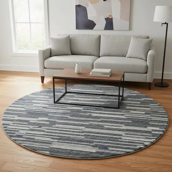 8' Gray Charcoal And Ivory Abstract Washable Round Rug With UV Protection Photo 1