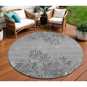 Photo of 8' Gray Charcoal And Ivory Round Floral Washable Indoor Outdoor Area Rug