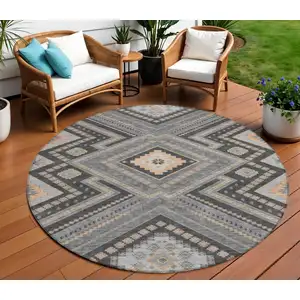 Photo of 8' Gray Charcoal And Pink Round Tribal Washable Indoor Outdoor Area Rug