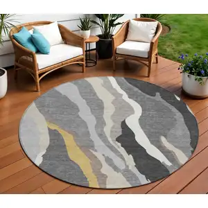Photo of 8' Gray Charcoal And Tan Round Abstract Washable Indoor Outdoor Area Rug