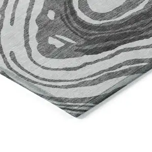 Photo of 8' Gray Charcoal And Tan Round Abstract Washable Indoor Outdoor Area Rug