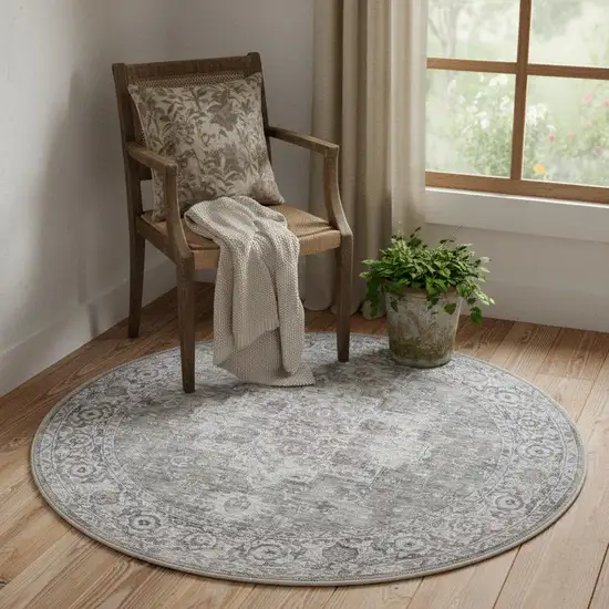 4' Gray Floral Power Loom Worn Faded Round Rug Photo 1