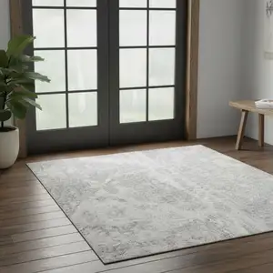 Photo of 6' Gray Floral Power Loom Worn Faded Runner Rug
