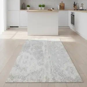 Photo of 8' Gray Floral Power Loom Worn Faded Runner Rug