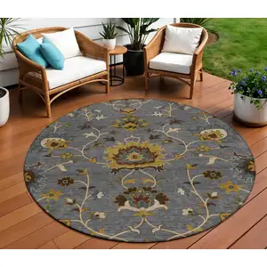 Photo of 8' Gray Gold And Beige Round Floral Washable Indoor Outdoor Area Rug