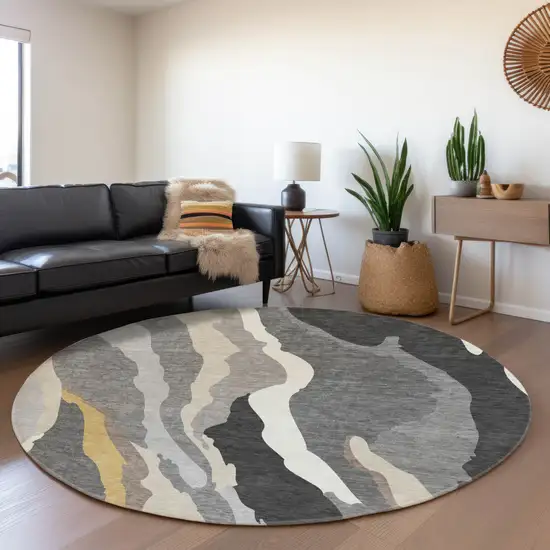 8' Gray Gold And Charcoal Abstract Washable Round Rug With UV Protection Photo 4