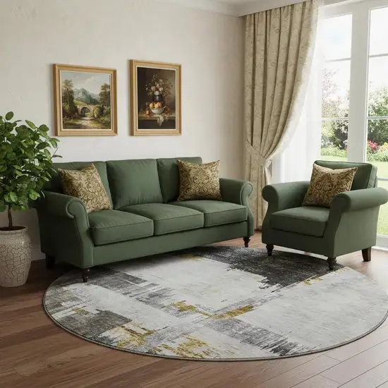 8' Gray Gold And Ivory Abstract Washable Round Rug With UV Protection Photo 1