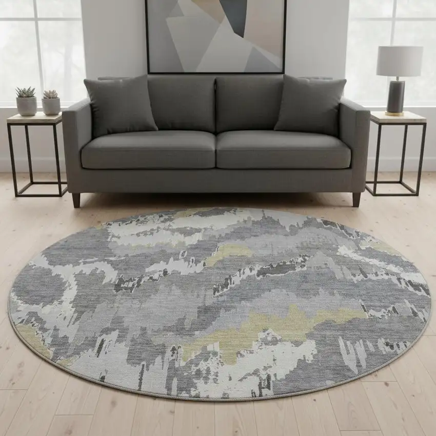 8' Gray Gold And Ivory Abstract Washable Round Rug With UV Protection Photo 1