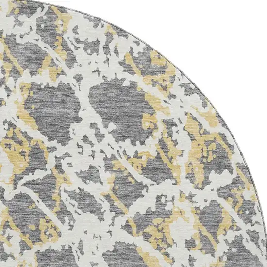 8' Gray Gold And Ivory Abstract Washable Round Rug With UV Protection Photo 3