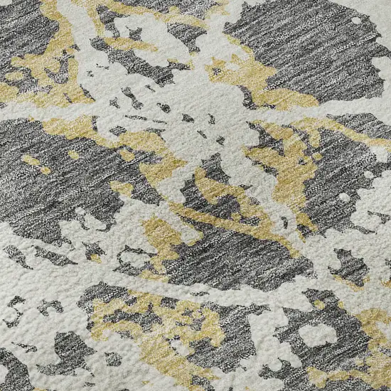8' Gray Gold And Ivory Abstract Washable Round Rug With UV Protection Photo 8