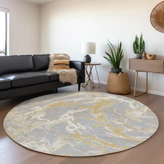 8' Gray Gold And Ivory Abstract Washable Round Rug With UV Protection Photo 4