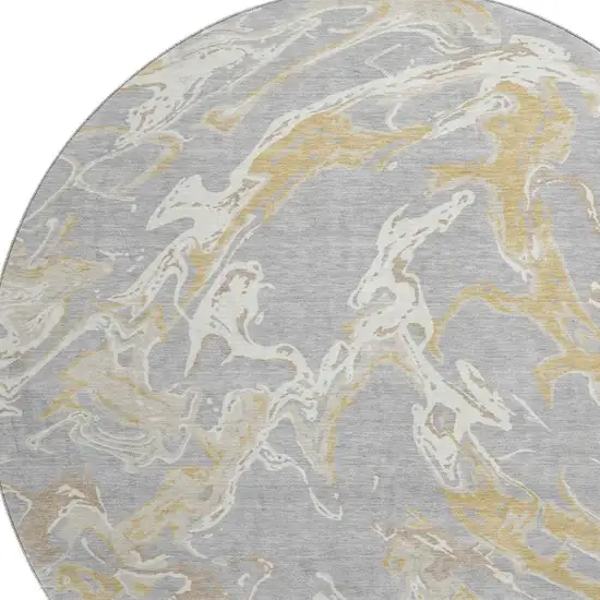 8' Gray Gold And Ivory Abstract Washable Round Rug With UV Protection Photo 2