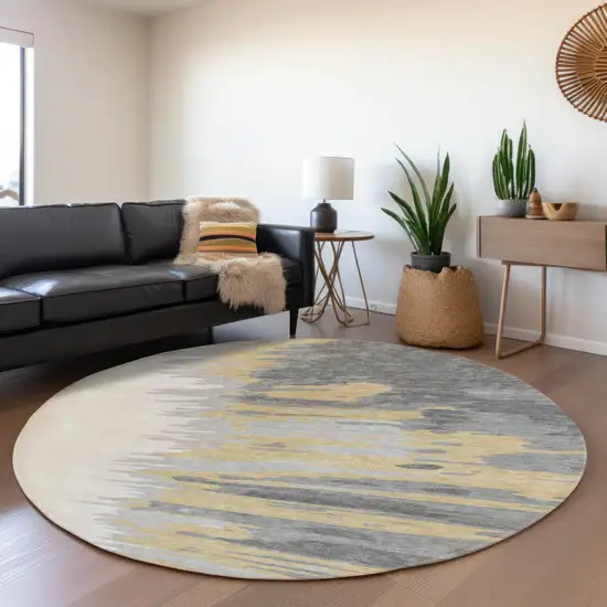 8' Gray Gold And Ivory Abstract Washable Round Rug With UV Protection Photo 4