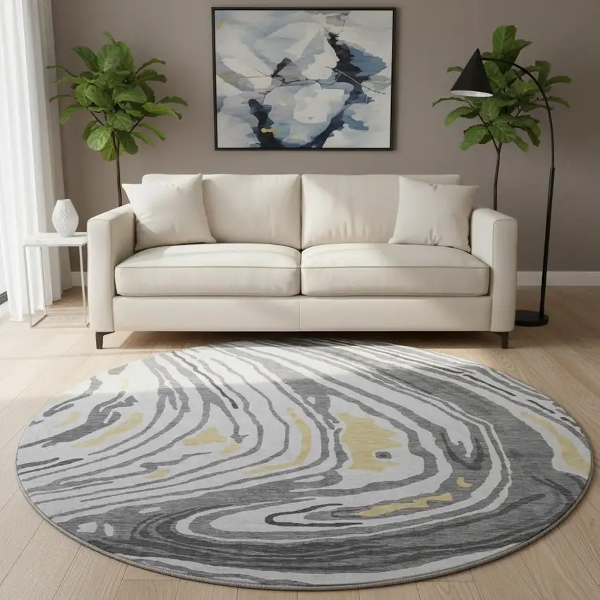 8' Gray Gold And Ivory Abstract Washable Round Rug With UV Protection Photo 2