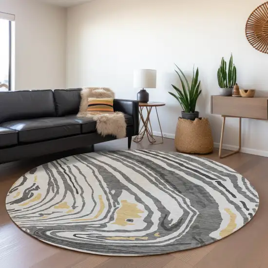 8' Gray Gold And Ivory Abstract Washable Round Rug With UV Protection Photo 4