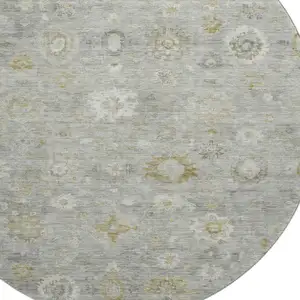Photo of 8' Gray Gold And Ivory Damask Washable Round Rug With UV Protection