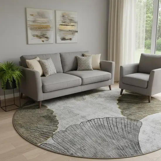 8' Gray Gold And Ivory Floral Washable Round Rug With UV Protection Photo 1
