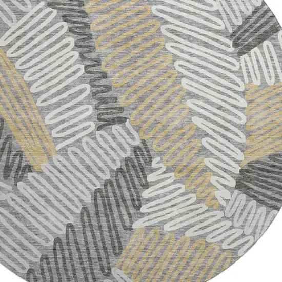 8' Gray Gold And Ivory Floral Washable Round Rug With UV Protection Photo 3