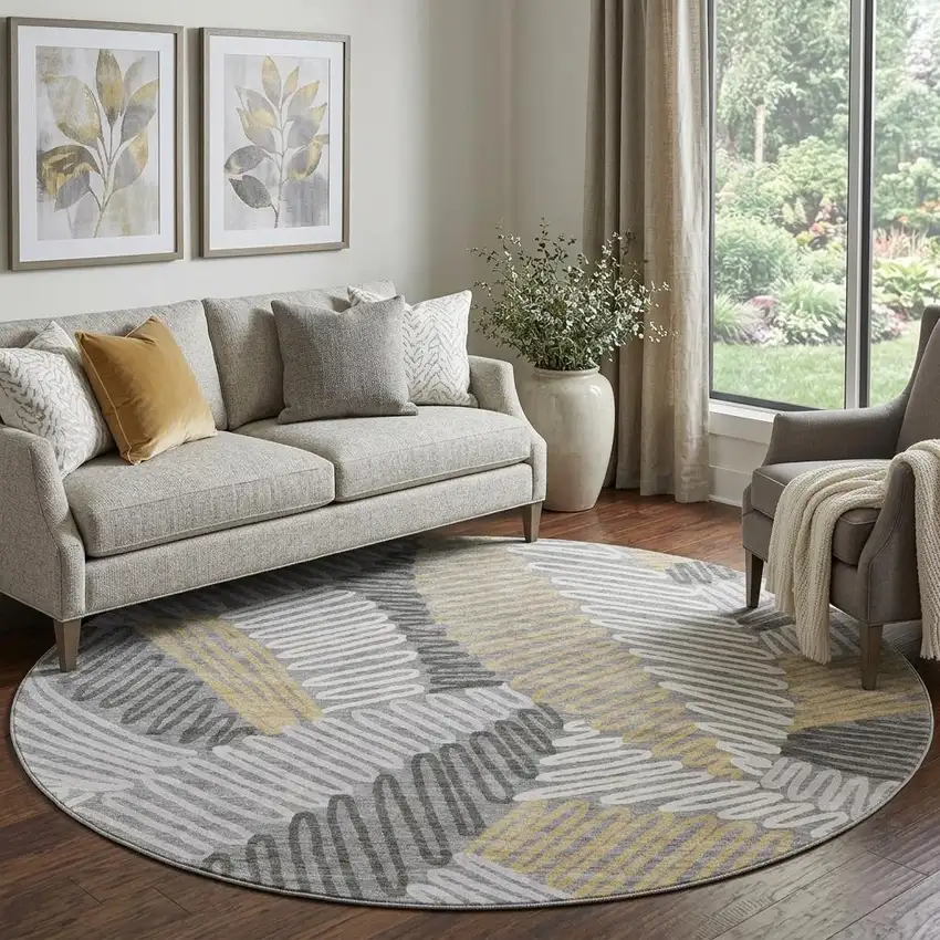 8' Gray Gold And Ivory Floral Washable Round Rug With UV Protection Photo 1