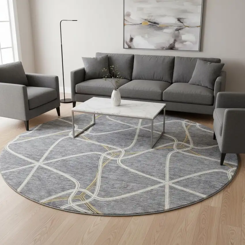 8' Gray Gold And Ivory Geometric Washable Round Rug With UV Protection Photo 2