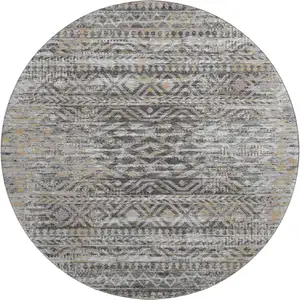 Photo of 8' Gray Gold And Ivory Moroccan Washable Round Rug With UV Protection
