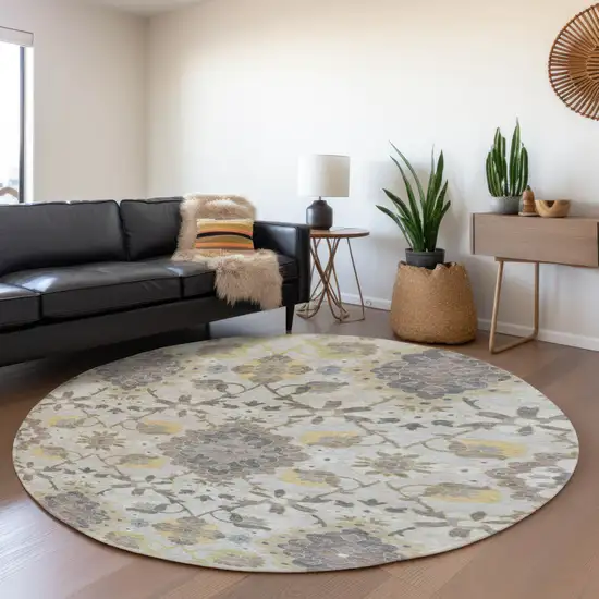 8' Gray Gold And Ivory Oriental Washable Round Rug With UV Protection Photo 4