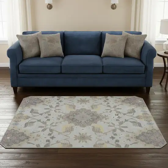 8' Gray Gold And Ivory Oriental Washable Round Rug With UV Protection Photo 2