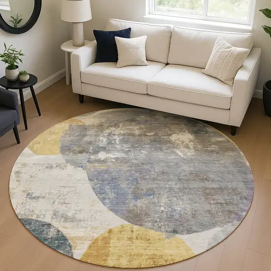 8' Gray Gold And Ivory Round Geometric Washable Indoor Outdoor Area Rug Photo 5