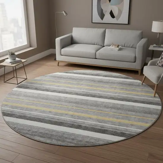 8' Gray Gold And Ivory Striped Washable Round Rug With UV Protection Photo 2