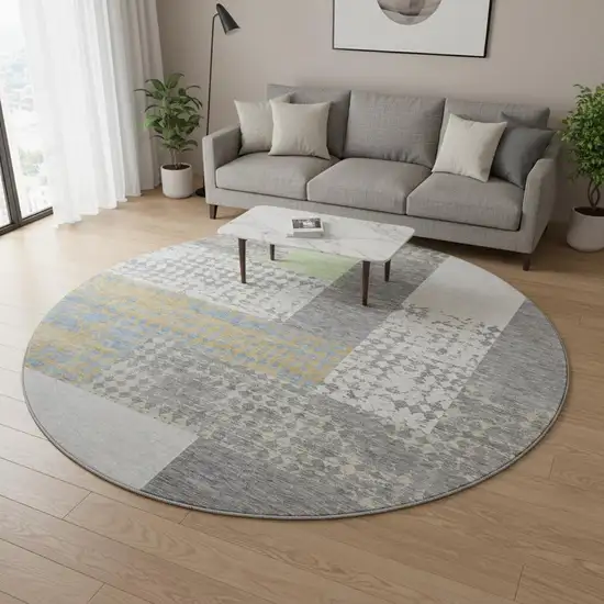 8' Gray Gold And Mint Green Geometric Washable Round Rug With UV Protection Photo 2