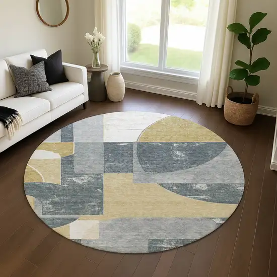 8' Gray Gold And Silver Abstract Geometric Washable Round Rug With UV Protection Photo 4