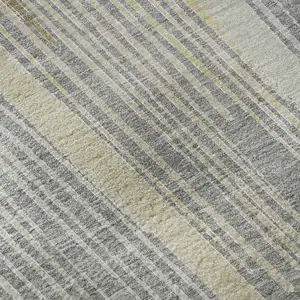 Photo of 8' Gray Gold And Silver Geometric Washable Area Rug With UV Protection