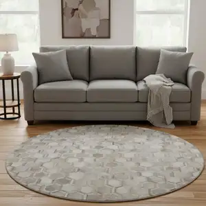 Photo of 8' Gray Ivory And Beige Geometric Washable Round Rug With UV Protection