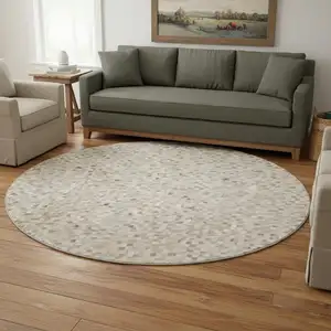 Photo of 8' Gray Ivory And Beige Geometric Washable Round Rug With UV Protection