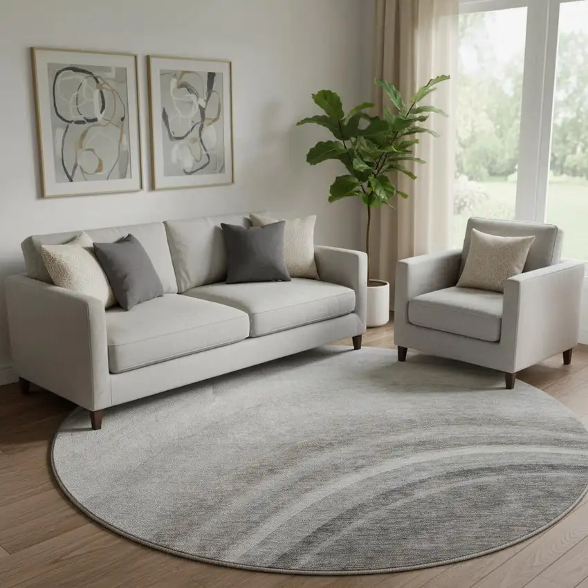 8' Gray Ivory And Beige Ombre Washable Round Rug With UV Protection Photo 1