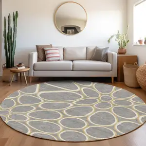 Photo of 8' Gray Ivory And Beige Round Abstract Washable Indoor Outdoor Area Rug