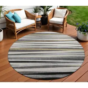Photo of 8' Gray Ivory And Beige Round Striped Washable Indoor Outdoor Area Rug