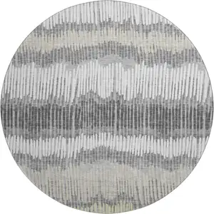 Photo of 8' Gray Ivory And Beige Striped Washable Round Rug With UV Protection