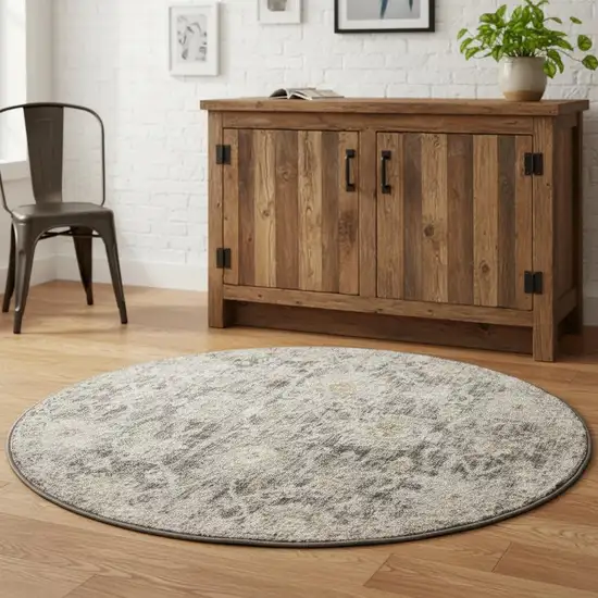 4' Gray Ivory And Black Floral Distressed Round Rug Photo 1