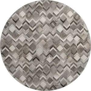 Photo of 8' Gray Ivory And Black Geometric Washable Round Rug With UV Protection