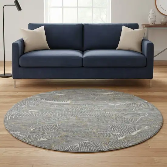 8' Gray Ivory And Gold Abstract Washable Round Rug With UV Protection Photo 2