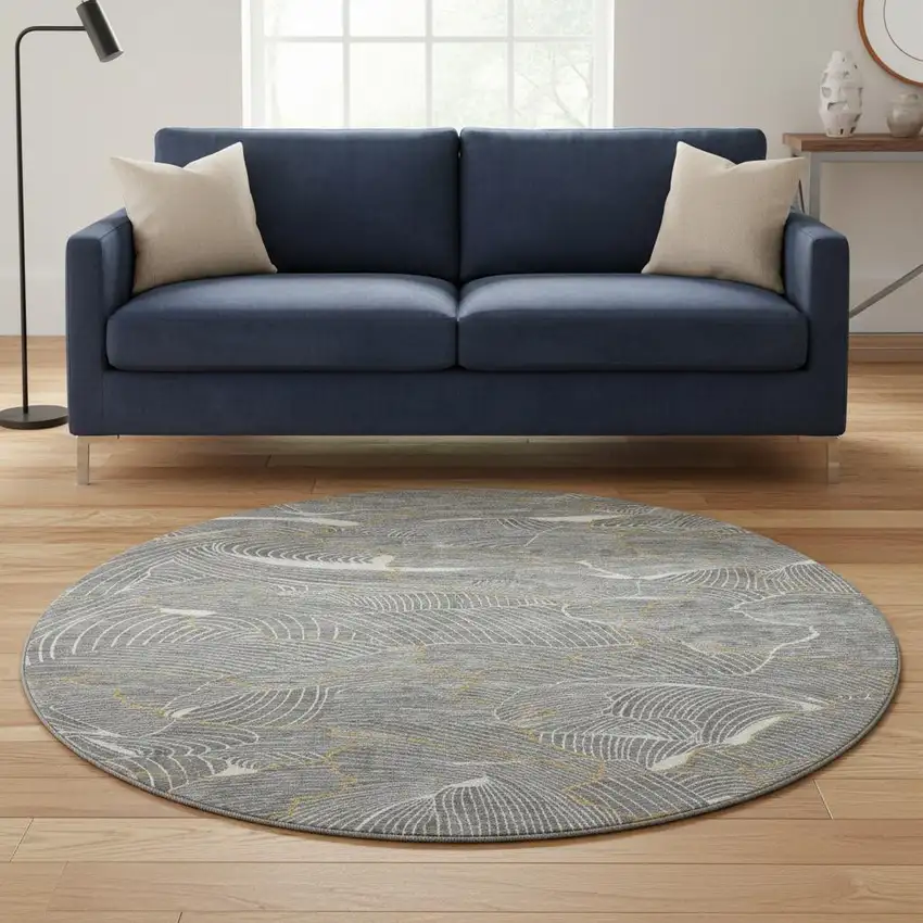 8' Gray Ivory And Gold Abstract Washable Round Rug With UV Protection Photo 2