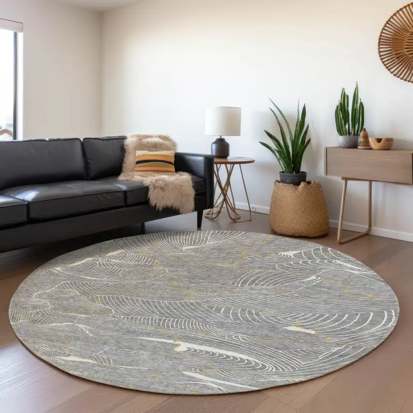 8' Gray Ivory And Gold Abstract Washable Round Rug With UV Protection Photo 4