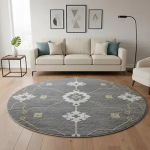 Photo of 8' Gray Ivory And Gold Floral Medallion Washable Round Rug With UV Protection