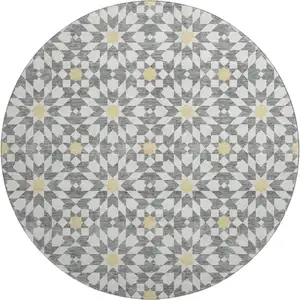 Photo of 8' Gray Ivory And Gold Geometric Washable Round Rug With UV Protection