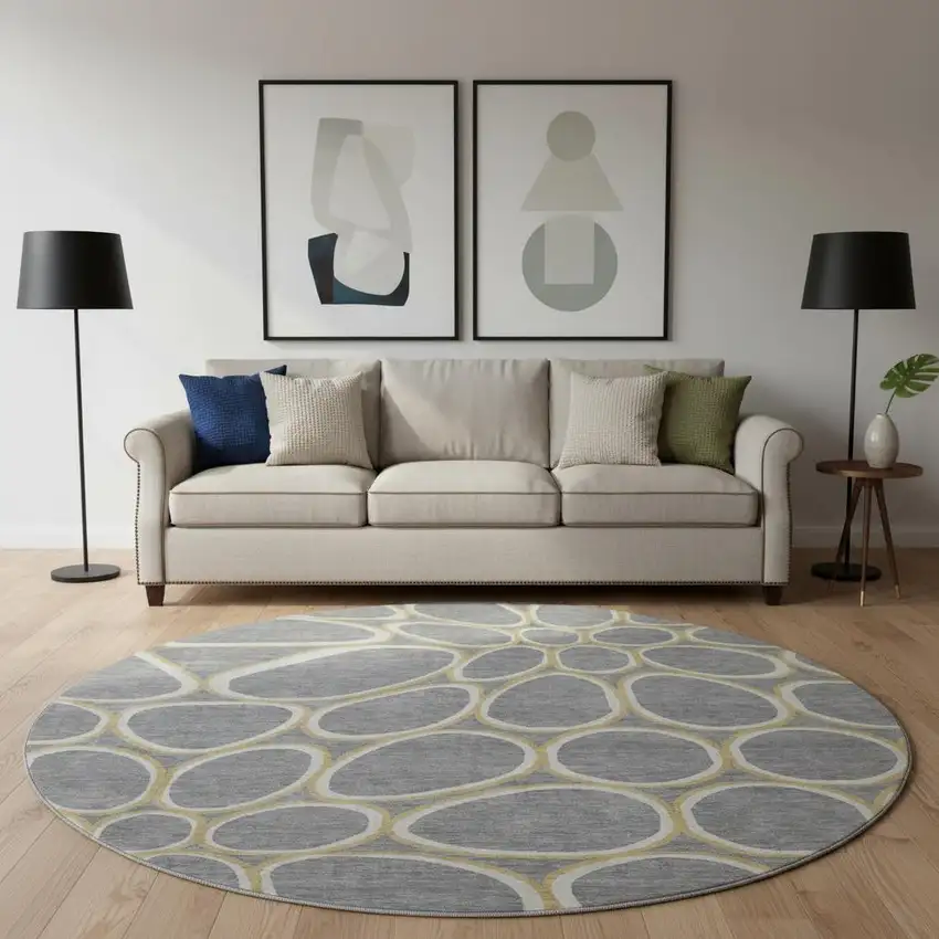 8' Gray Ivory And Gold Geometric Washable Round Rug With UV Protection Photo 2