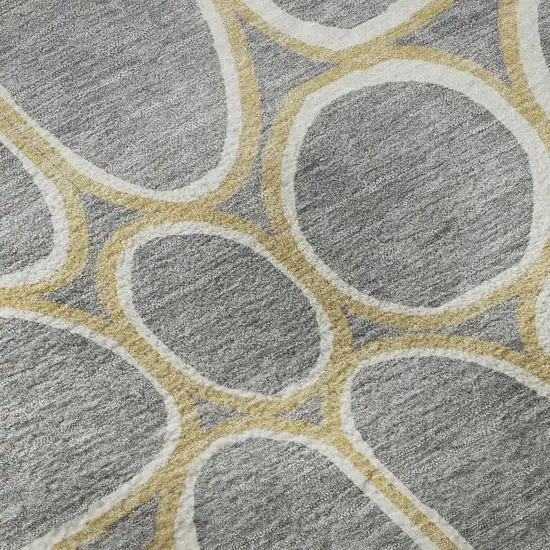 8' Gray Ivory And Gold Geometric Washable Round Rug With UV Protection Photo 8